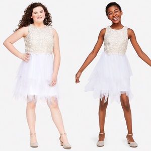 Justice Sleeveless white and cream fairy hem dress